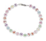 Perle plastique innspiro forme ronde plate 7mm         imprimee alphabet couleur sur fond blanc lot de 1200 perles
