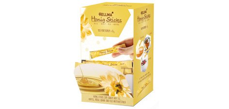Stick de miel, dans un présentoir en carton