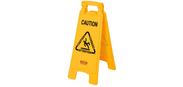 Panneau d'avertissement 'Caution', sol glissant trilingue