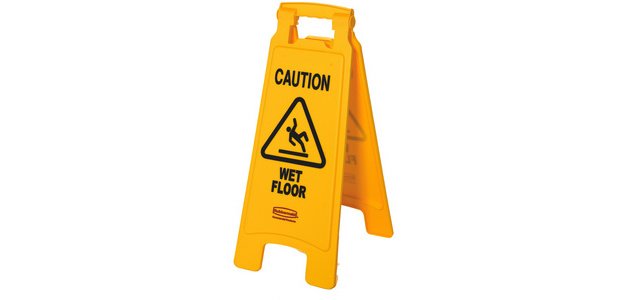 Panneau d'avertissement 'Caution Wet Floor'