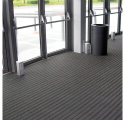 Tapis en dalles modulables pour fosse d'entrée