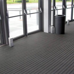 Tapis en dalles modulables pour fosse d'entrée