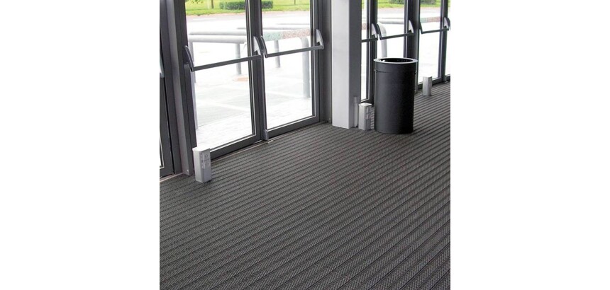 Tapis en dalles modulables pour fosse d'entrée