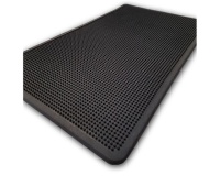Tapis à picots et bords arrondis