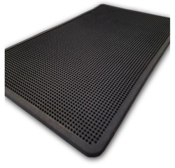 Tapis à picots et bords arrondis