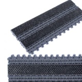 Tapis en dalles modulables pour fosse d'entrée