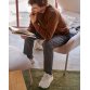 Fauteuil Belina en chenille beige et acier avec finition blanche