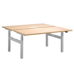 Height-adjustable Ergomaxx sit-stand desk cluster with electric height adjustment and top access