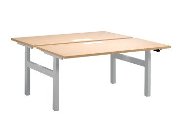 Height-adjustable Ergomaxx sit-stand desk cluster with electric height adjustment and top access