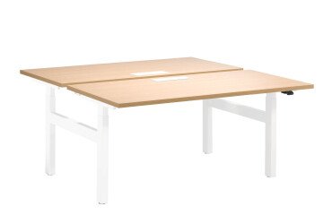 Height-adjustable Ergomaxx sit-stand desk cluster with electric height adjustment and top access