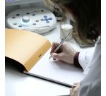 Bloc de bureau Rhodia 21 x 31,8 cm agrafé n°19 orange - ligné -80 feuilles