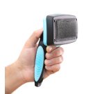 Cepillo ergonómico para mascotas con púas retráctiles