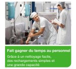 Distributeur Tork à dévidage central blanc et turquoise M2, design compact, gamme Performance