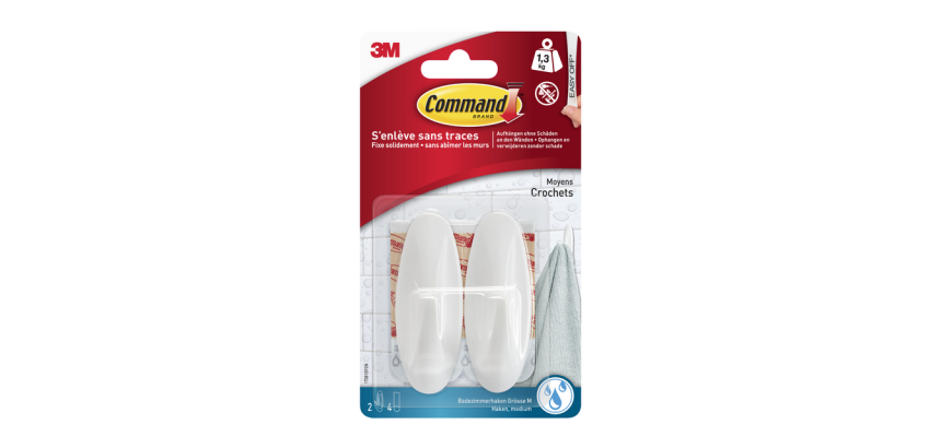 White oval Command plastic hook with adhesive strip