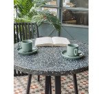 Mesa redonda Tella terrazo negro y patas de acero Ø 70 cm