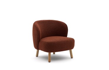 Ulit armchair in terracotta bouclé with solid beech wood legs in a natural finish