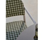 Tuccia beige and green stackable chair in aluminium and synthetic rattan