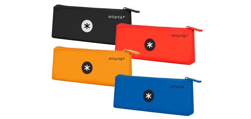 Trousse antartik triangulaire 1 compartiment silicone soft  touch coloris pastels         assortis