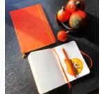 Rhodiarama carnet souple A5 160 pages ligné papier ivoire 90g fermeture élastique - Tangerine