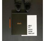 Notepad Rhodiactive 90g reliure intégrale A5 14,8x21 cm 160 pages ligné microperforé - Noir