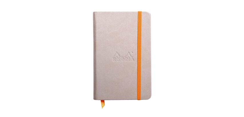 Rhodiarama carnet rembordé rigide 9x14 cm 192 pages uni papier ivoire 90g fermeture élastique - Beige