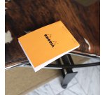 Bloc de bureau Rhodia agrafé orange Giant Pad N°15 14,8 x 21 cm - 5 x 5 - 150 feuilles