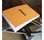 Bloc de bureau Rhodia agrafé orange Giant Pad N°15 14,8 x 21 cm - 5 x 5 - 150 feuilles