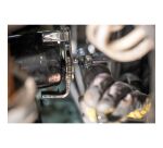 Clé à filtre autoserrante